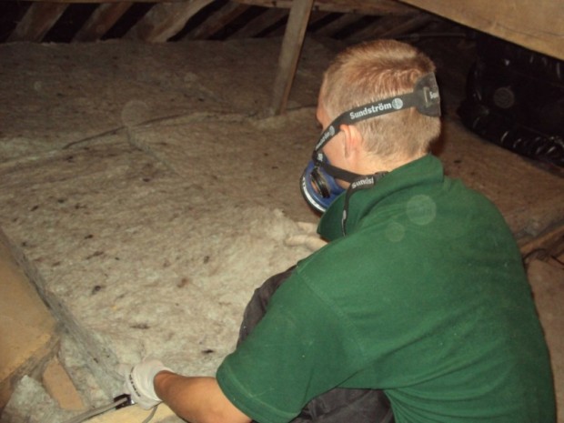 Laying down loft insulation